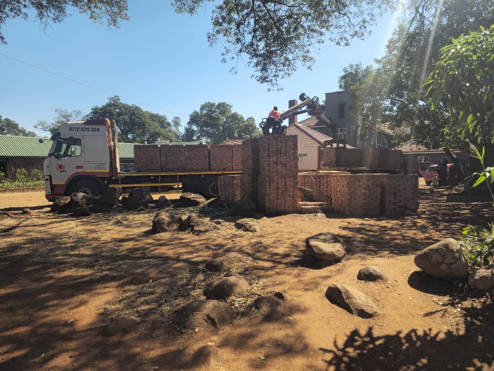 Truck delivering bricks to a ZIFRAC site